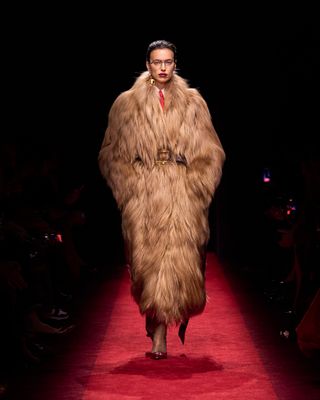 Milan fashion week AW25 trend mob wife faux fur coats