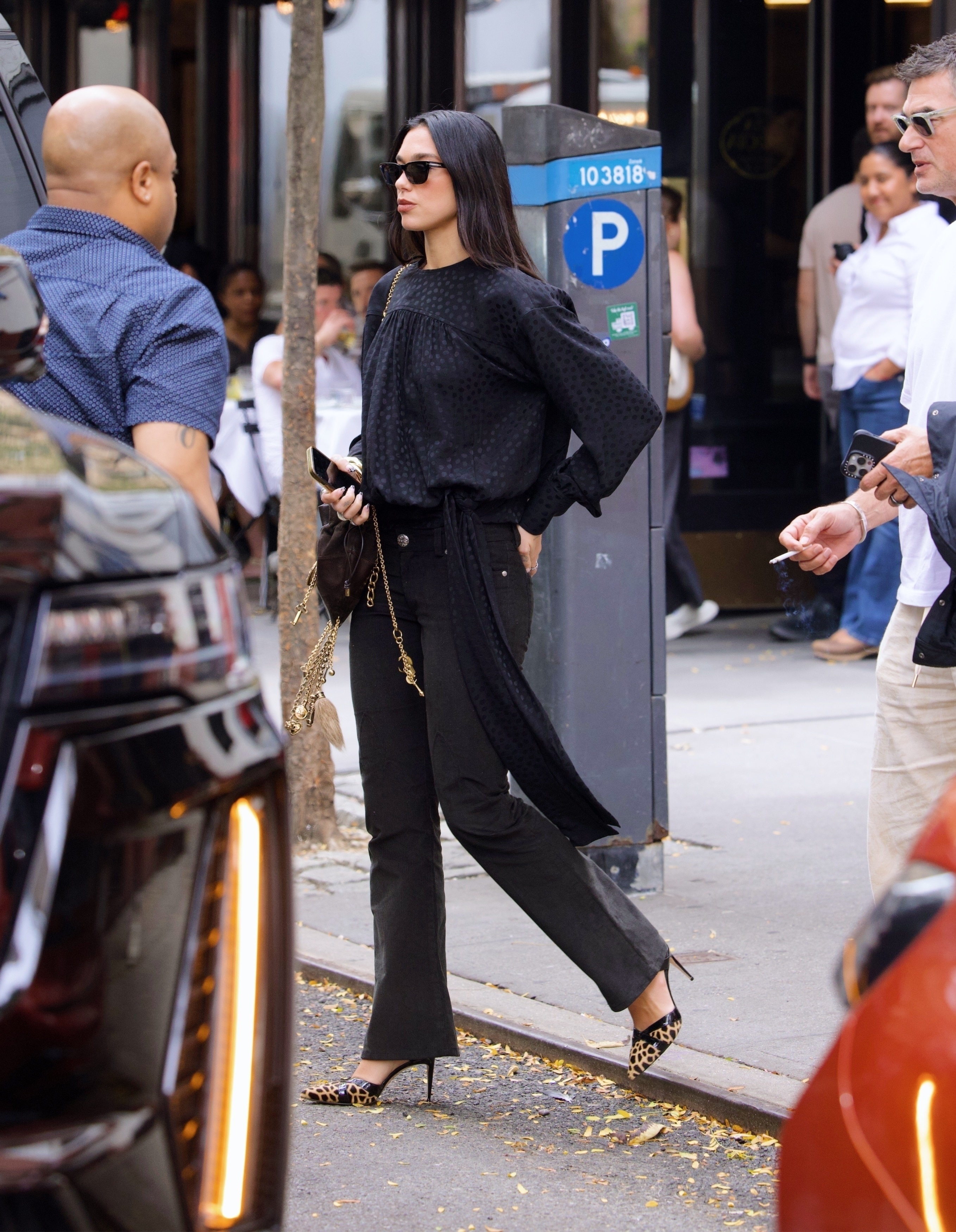 Dua Lipa was spotted in black straight-leg jeans, cheetah heels, and a Chlo&amp;eacute; purse in the West Village