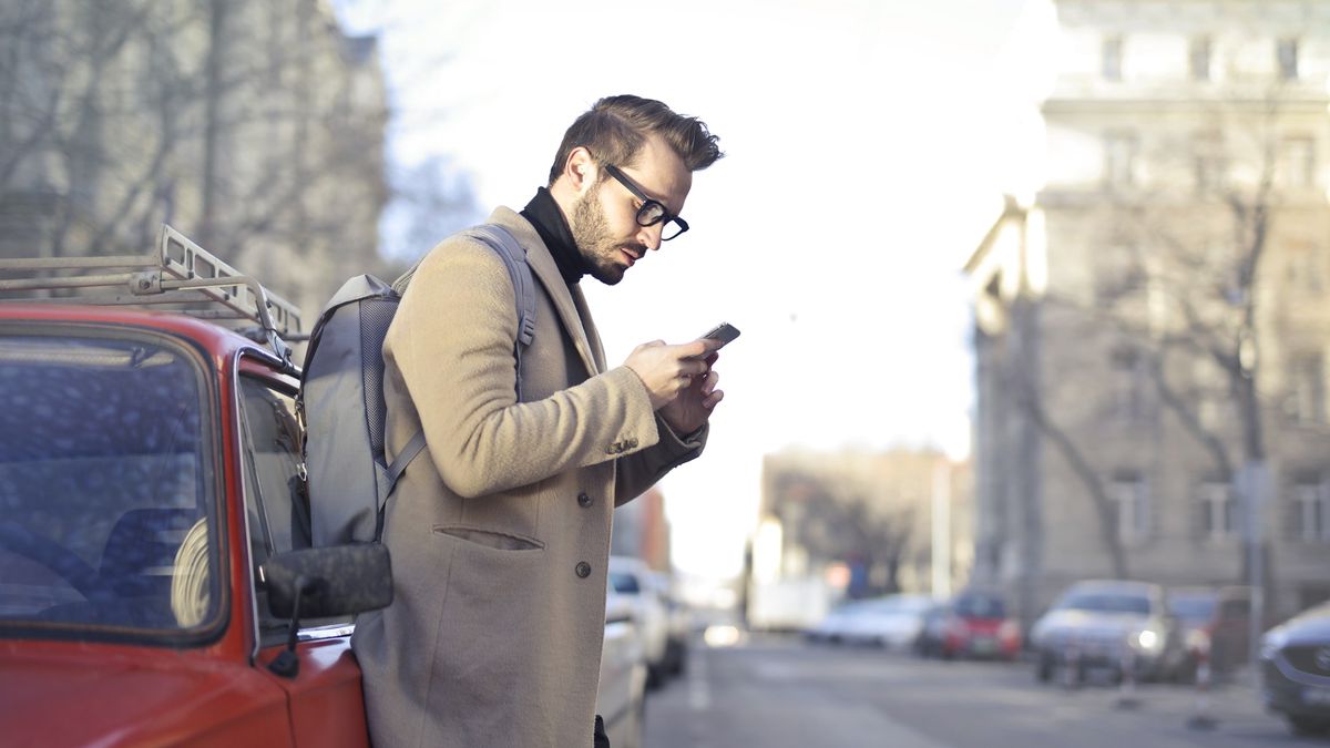 Man on mobile phone in street