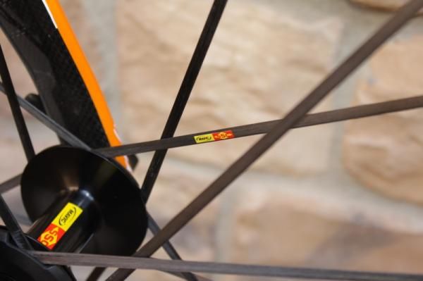 The Cosmic SLR utilizes tensioned carbon fiber spokes.