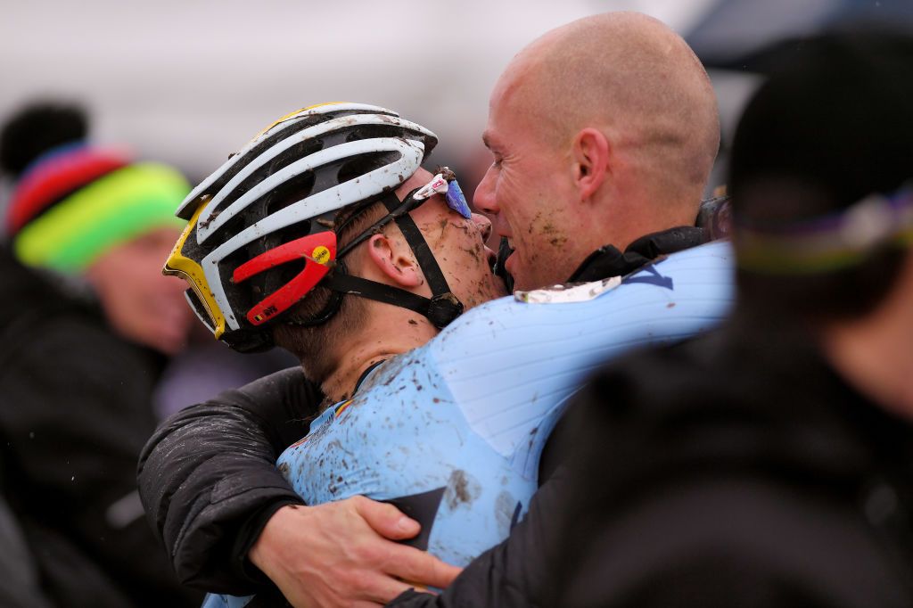 Thibau Nys is congratulated by his father, Sven