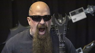 Kerry King shows off his new Dean signature model at NAMM 2023