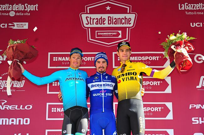 Astana&#039;s Jakob Fuglsang, winner Julian Alaphlippe (Deceuninck-QuickStep) and Wout van Aert (Jumbo-Visma) on the 2019 Strade Bianche podium