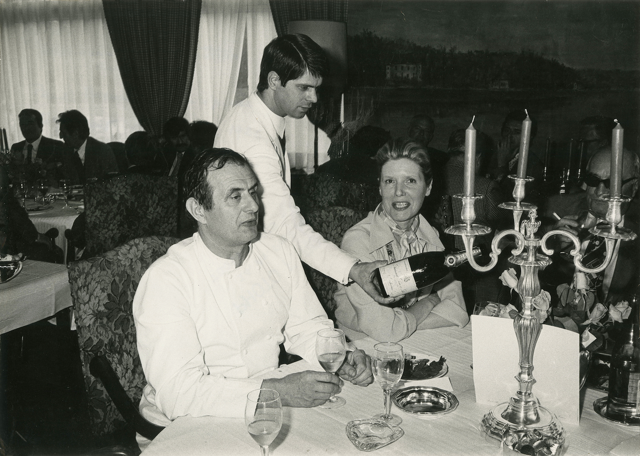 Paul Bocuse drinking Ruinart Champagne