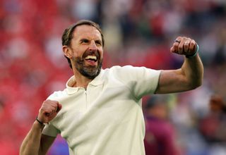 Gareth Southgate celebrates after England's win over Switzerland on penalties at Euro 2024.
