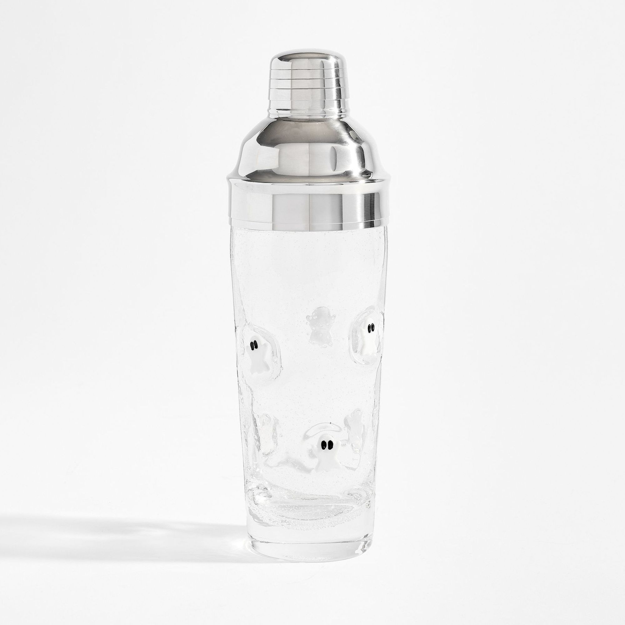 Glass cocktail shaker with silver lid and ghost design