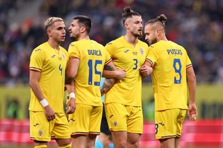 Players of Romania form a defensive wall during the international friendly match between Romania and Northern Ireland at National Arena on March 22, 2024 in Bucharest, Romania.(Photo by Robbie Jay Barratt - AMA/Getty Images)