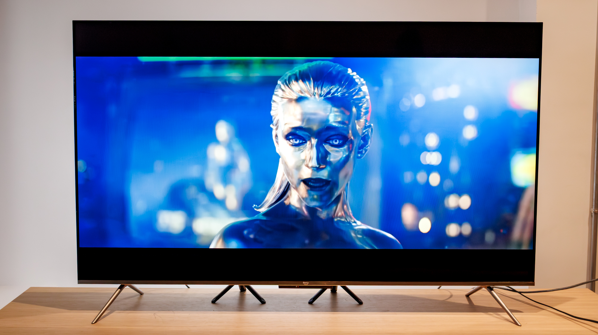 Amazon Fire TV Omni QLED Series TV (2025) on a table