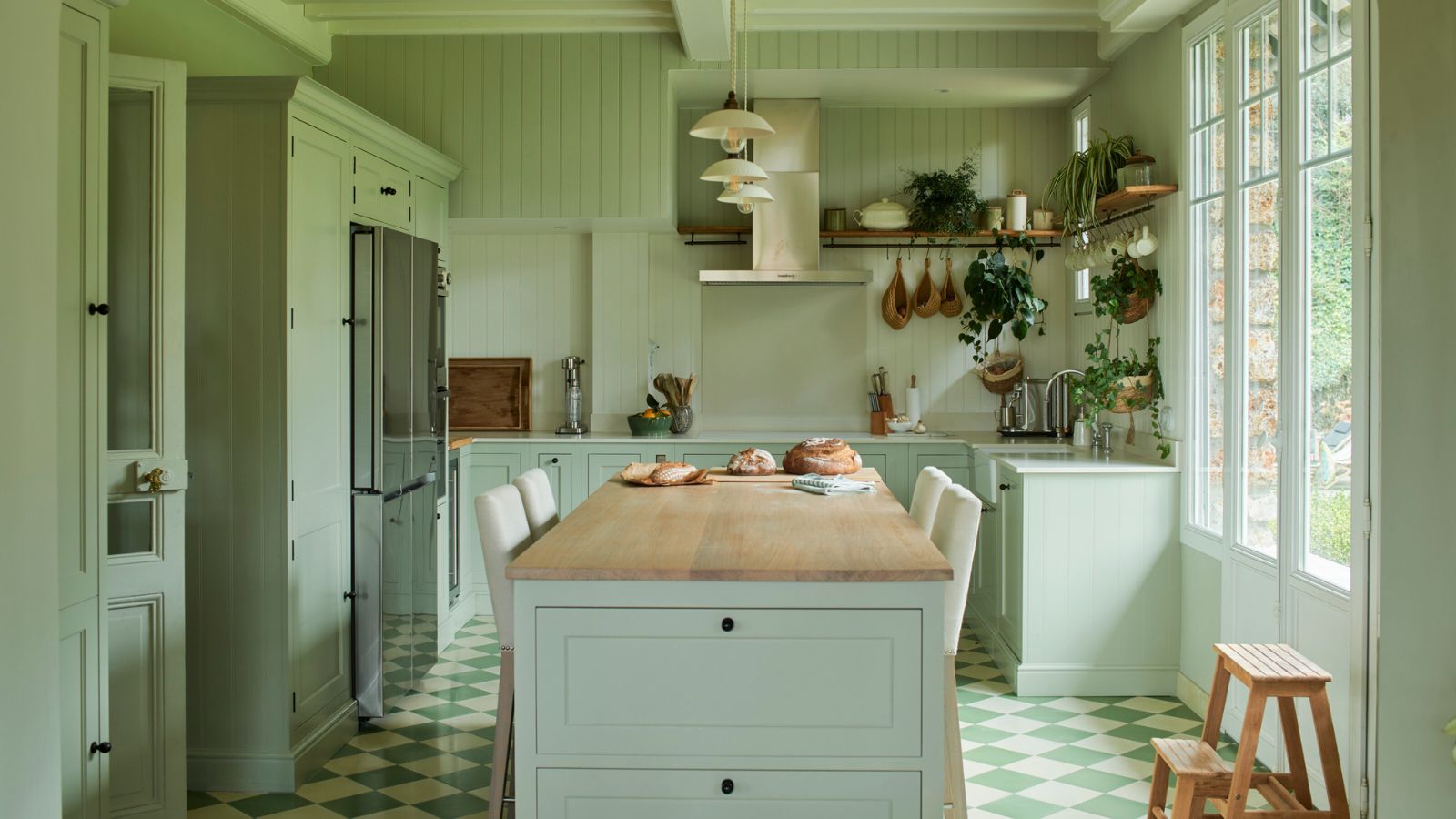 Pale blue color drenched kitchen