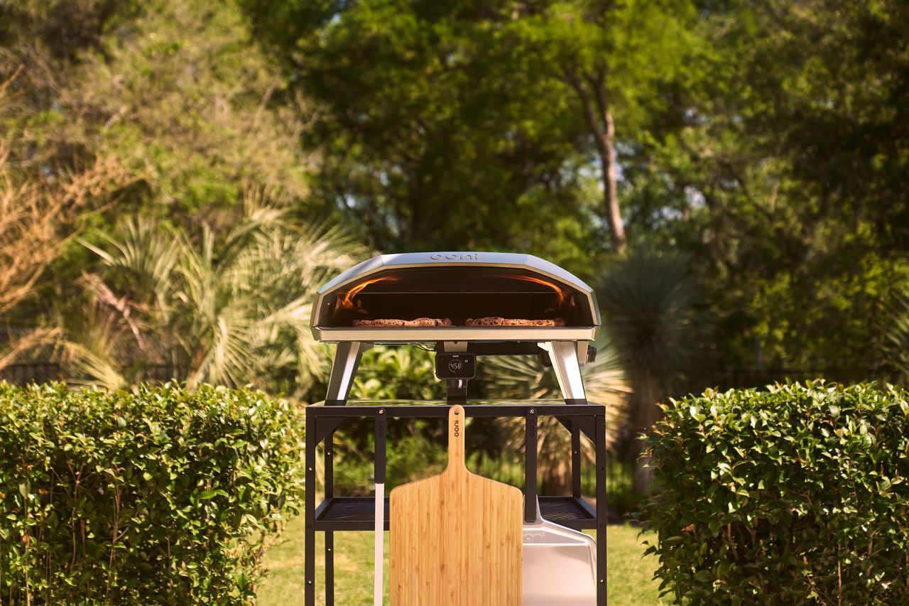 Ooni&#039;s latest pizza oven, The Koda 2 Max featured in a backyard