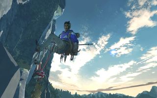 A woman hangs from a cliff face