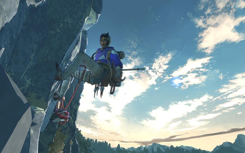 A woman hangs from a cliff face