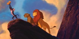 Rafiki holds up Simba in the original Lion King