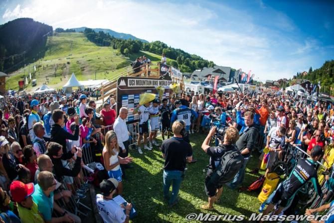 Fans watch as the top 3 Absalon, Schurter, Fumic do post race interviews