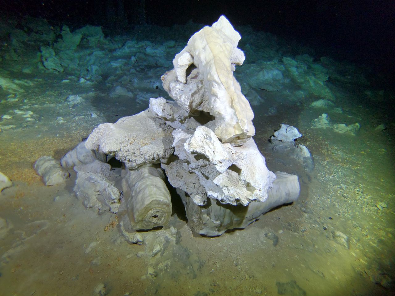 A human-made pile of stones, likely used as a marker, that Indigenous people made out of rocks found in the cave, such as stalactites and stalagmites.