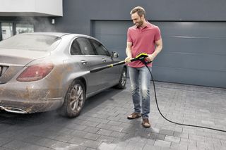 cleaning a car with the Karcher K7 pressure washer