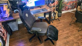 The Secretlab Otto Legrest in front of a gaming chair at a desk setup