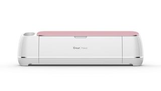 Cricut Maker vs Cricut Maker 3; a rose coloured craft cutting machine