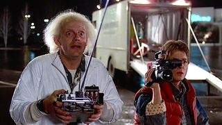 Back to the Future&#039;s Marty McFly and Doc stare wide-eyed