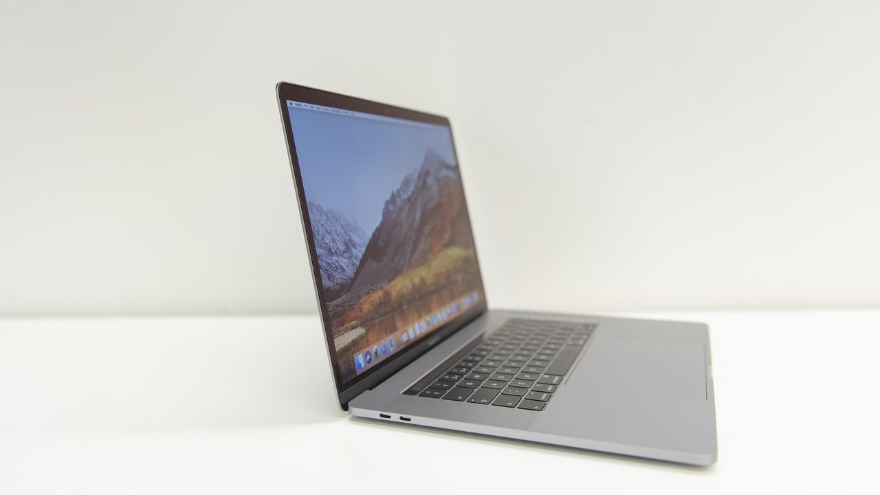 The Apple MacBook Pro 15in (2018) from the side with the lid open