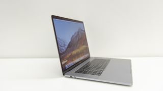 The Apple MacBook Pro 15in (2018) from the side with the lid open