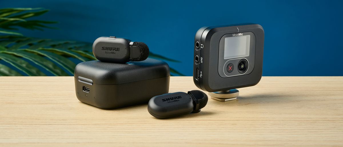 A pair of Shure MoveMic Two wireless microphones with a receiver