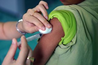 A child getting vaccinated.