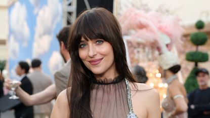 Dakota Johnson in pastel pink dress for the Vogue World Hollywood 2025 runway at Paramount Studios on October 26, 2025