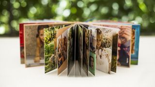 Pages of a photo book fanned out