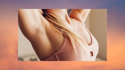 woman with underarm hair in a pink bra with her arms up—to illustrate what to do with ingrown hair