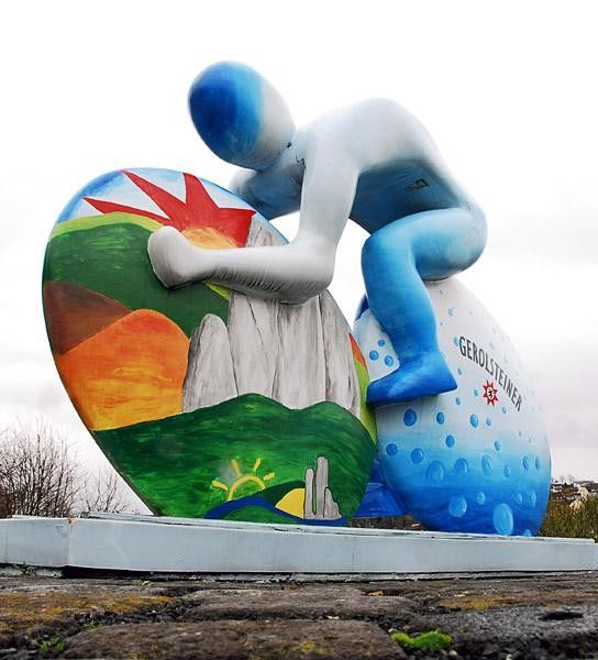 A statue in Gerolstein depicts a colourful team rider.