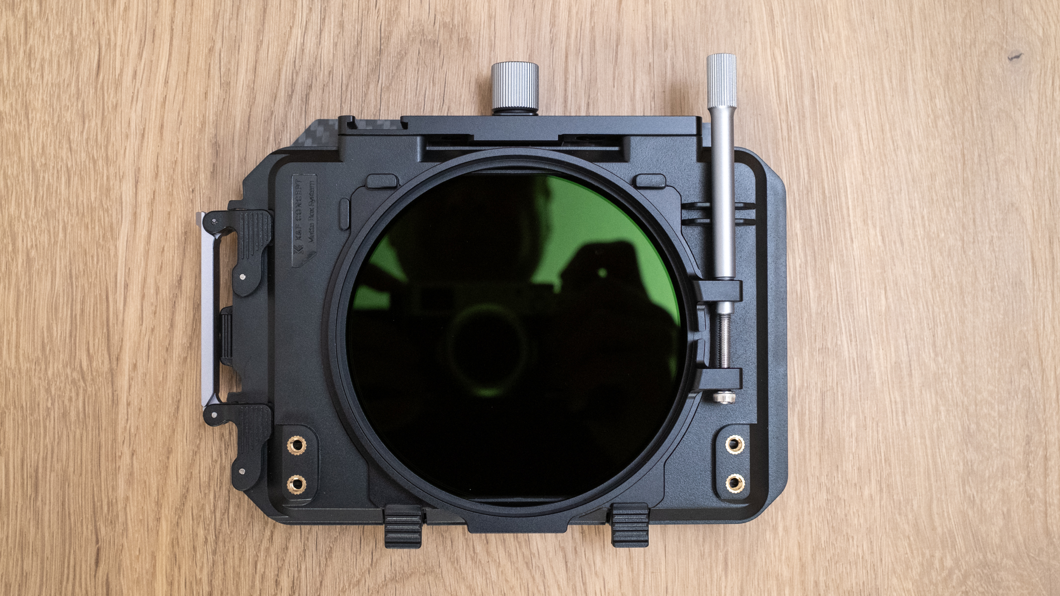 K&F Concept Matte Box Kit rear view on a wooden floor with filters in place
