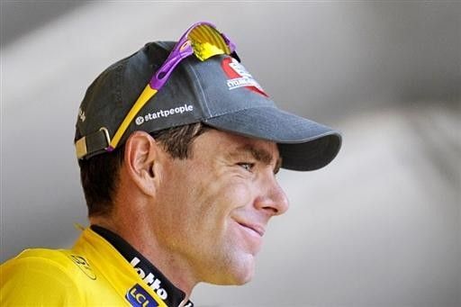 Cadel Evans was more composed his second time up on the yellow jersey podium.