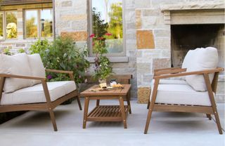 A wooden outdoor lounge set