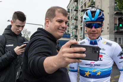 Fabio Jakobsen takes a selfie with a fan