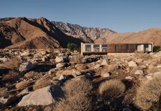 Desert Palisades house set in a rocky landscape in California 