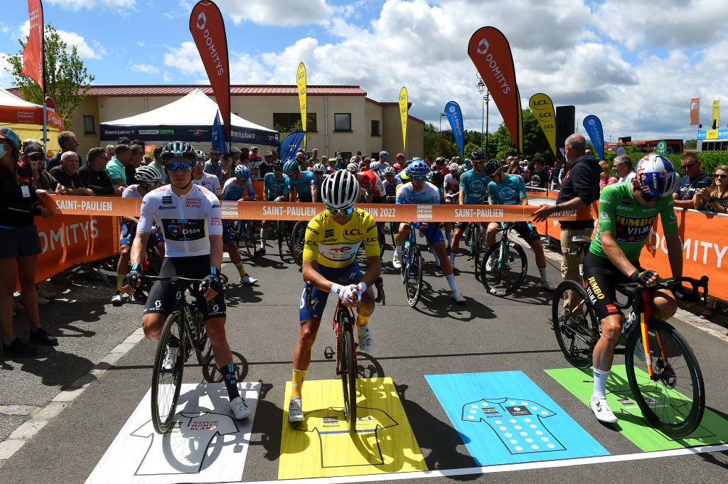 CHASTREIXSANCY FRANCE JUNE 07 LR Kevin Vermaerke of United States and Team DSM White Best Young Rider Jersey Alexis Vuillermoz of France and Team Total Energies Yellow Leader Jersey and Wout Van Aert of Belgium and Team Jumbo Visma Green Points Jersey prior to the 74th Criterium du Dauphine 2022 Stage 3 a 169km stage from SaintPaulien to ChastreixSancy 1391m WorldTour Dauphin on June 07 2022 in ChastreixSancy France Photo by Dario BelingheriGetty Images