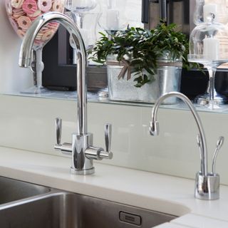 kitchen sink with two taps