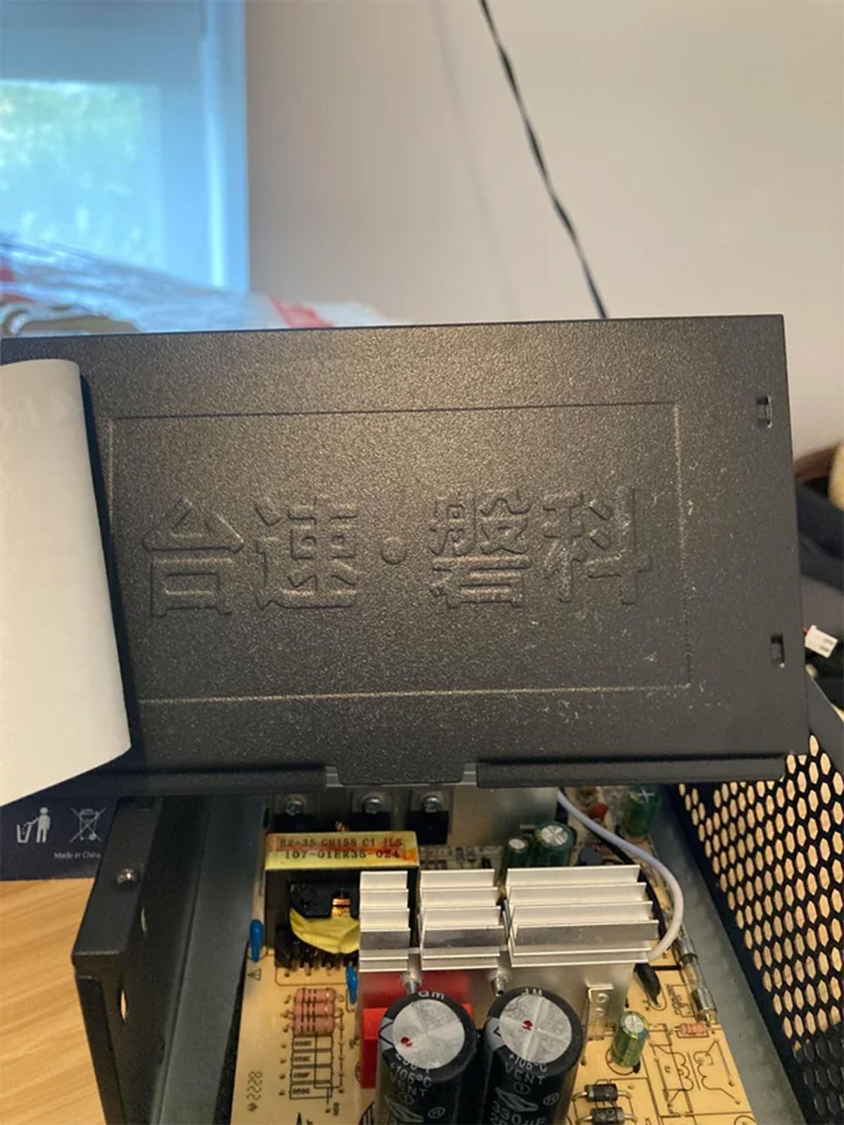 A teardown of a cheap PSU included with a budget PC case.