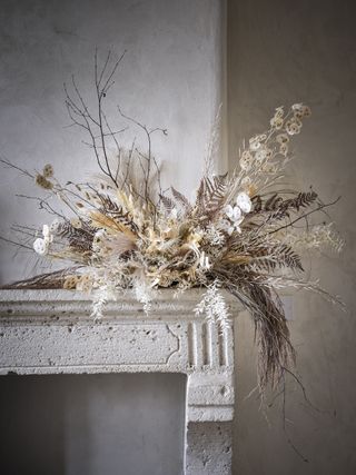 Dried flowers on a mantel