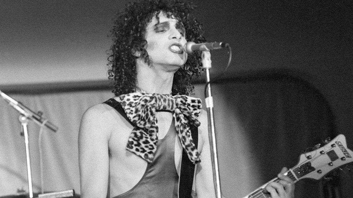 Sylvain Sylvain of New York Dolls performs on stage at the Rainbow Room at the fashion store Biba in Kensington, London on 26th November 1973