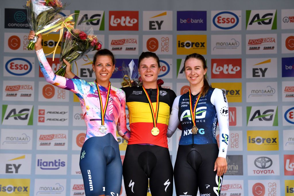 GAVERE BELGIUM JUNE 23 Silver medalist Shari Bossuyt of Belgium gold medalist Lotte Kopecky of Belgium and bronze medalist Britt Knaven of Belgium pose on the podium during the medal ceremony after the the 123rd Belgian Road Championship 2022 Womens Individual Time Trial a 23km individual time trial one day race from Gavere to Gavere ITT BelgianCycling140 on June 23 2022 in Gavere Belgium Photo by Luc ClaessenGetty Images