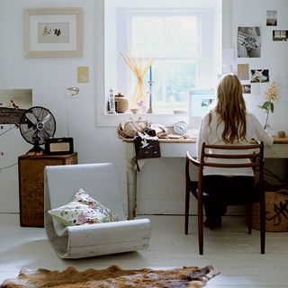 Home office with white walls and women