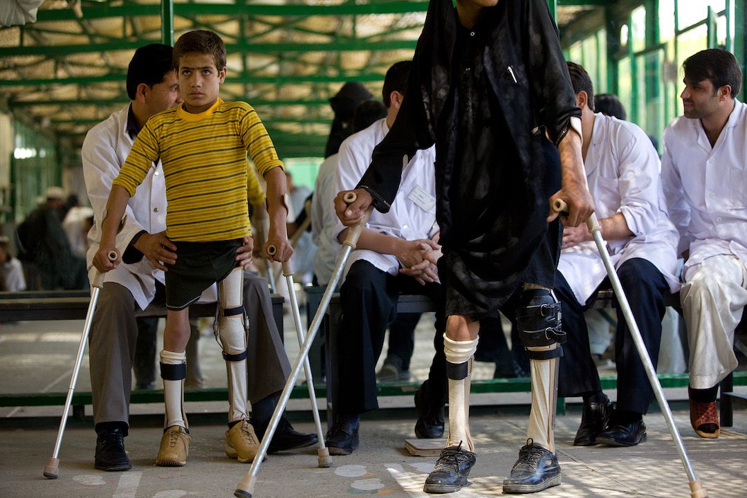 Polio survivors test out new pairs of leg braces at an orthopedic clinic in Afghanistan in September, 2009. Afghanistan is one of the few countries still dealing with the disease.