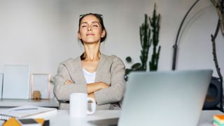 A woman taking a meditative moment