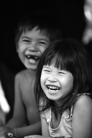 Laughter is the best medicine in this photo by Pierre-Etienne Vincent, in Phnom Penh, Cambodia.