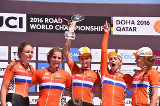 The Dutch team celebrate on the podium