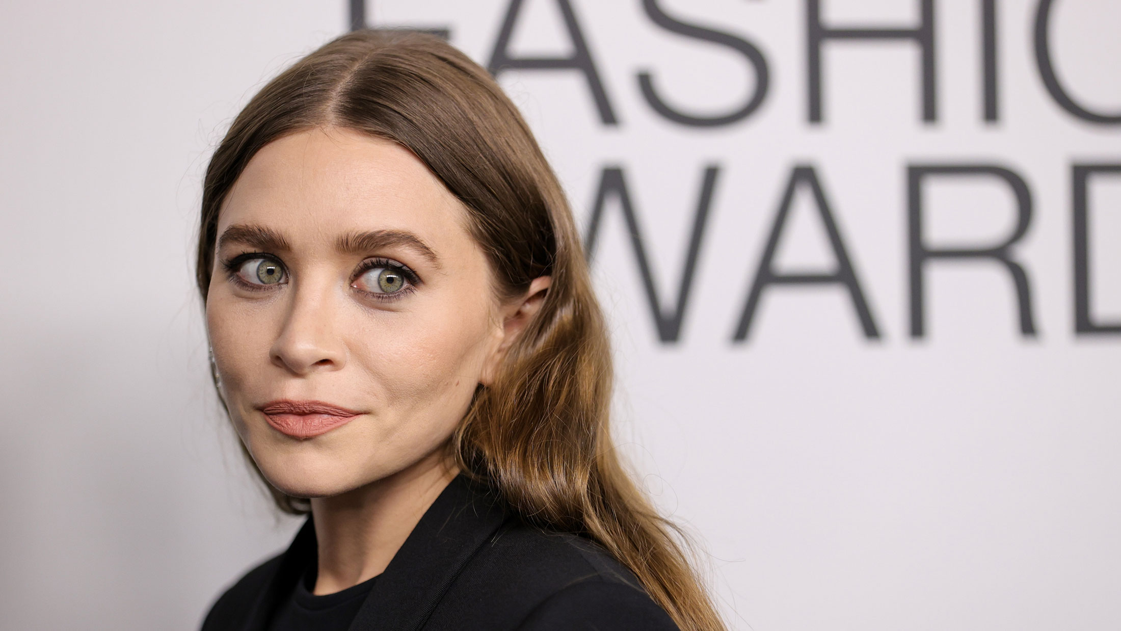Ashley Olsen looks over her shoulder on the red carpet