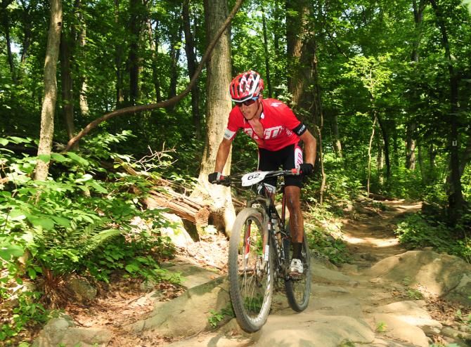 Howard Gotts (Specialized) training the leaders by nearly ten seconds at the end of lap four