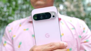 Google Pixel 9 Pro XL held in the hand.